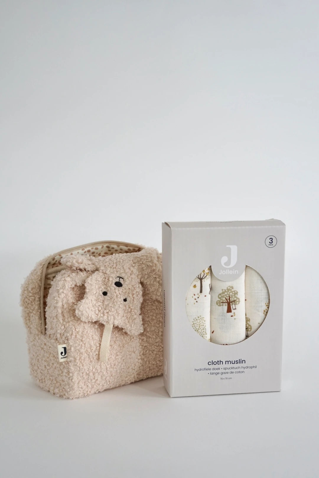 Eine schön Gestaltete Geschenkbox für Neugeborene von swz-art mit Beutel in teddystoff, ein Schmusetuch Teddy Bear und ein 3er Set spücktücher mit tiny park muster