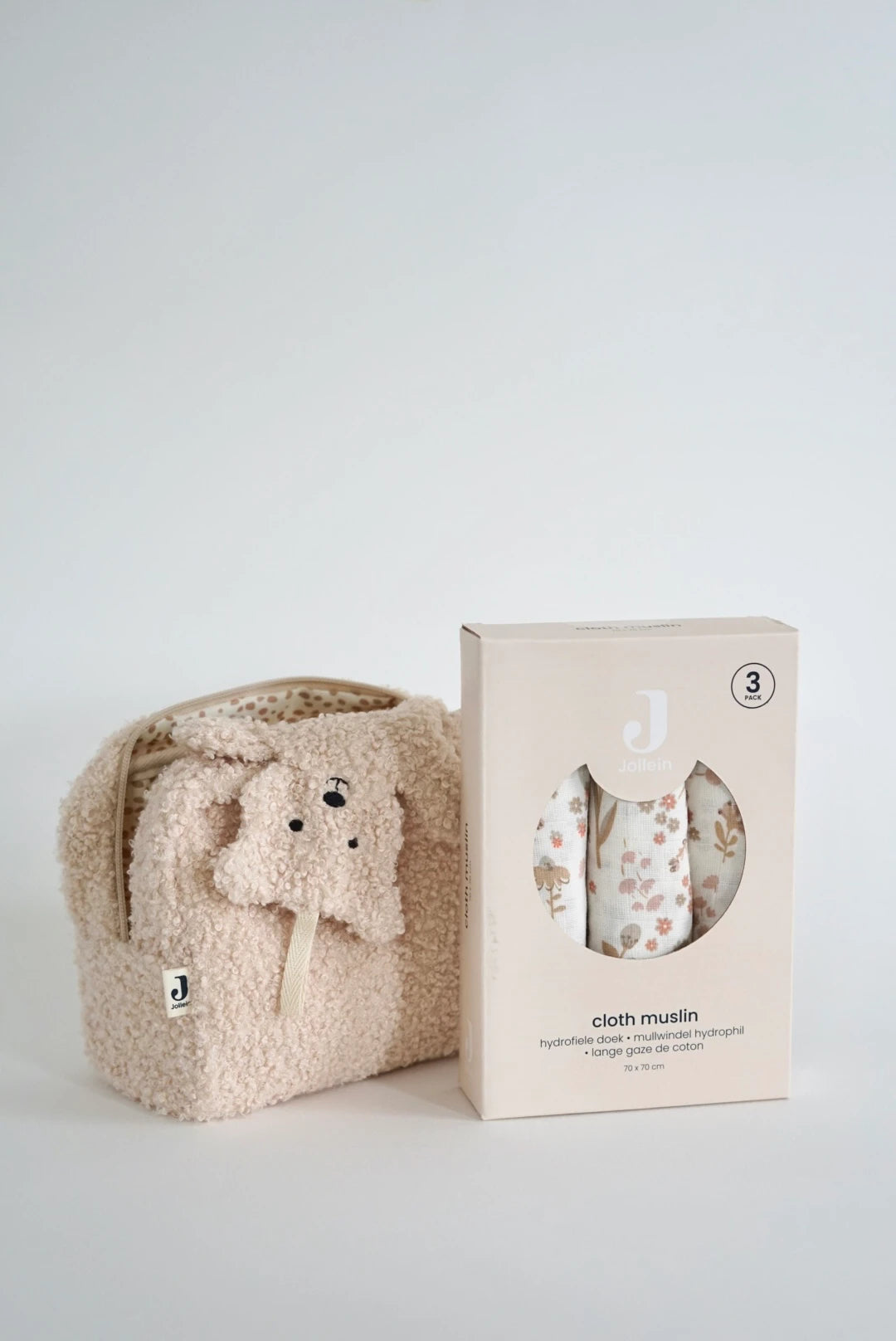 Eine schön Gestaltete Geschenkbox für Neugeborene von swz-art mit Beutel in teddystoff, ein Schmusetuch Teddy Bear und ein 3er Set spücktücher mit blumenmuster